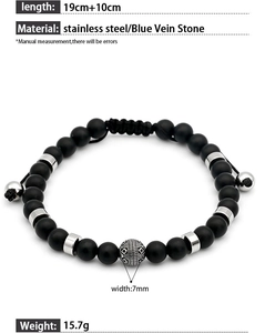 Detail of beaded bracelet with black onyx stones and stainless steel grid bead
