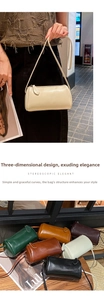 Chic cylindrical shoulder bag for women, soft leather crossbody bag with zipper closure.