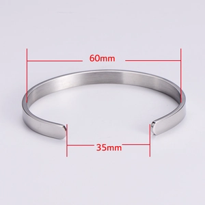 Detail view of 6mm wide stainless steel C-shape cuff bracelet showing 60mm diameter dimensions