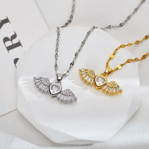 Elegant wing bow pendant necklace with zircon crystals in silver and gold plating