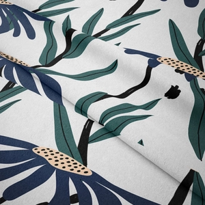 Close-up of hand-painted floral tapestry fabric with detailed navy flowers and green leaves