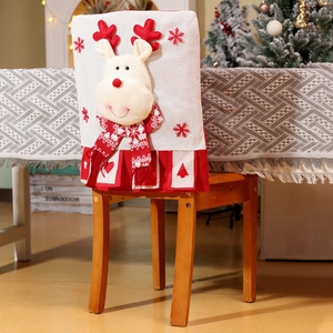 Detail of Christmas chair cover featuring a 3D knitted reindeer doll and snowflake embroidery