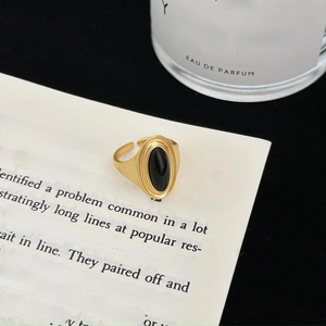 Vintage 925 sterling silver open ring with oval black onyx and gold textured band