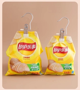 Detail showing strong stainless steel hook clips sealing snack bags for organization