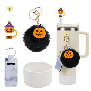 Detailed Halloween tumbler accessories kit with pumpkin pom-pom charm and straw cover
