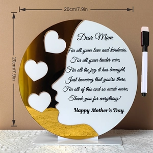 Detail of round acrylic Mother's Day plaque with gold mirror text and heart cutouts