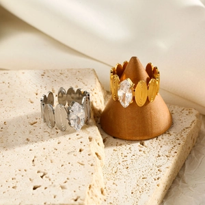Macro view of geometric stainless steel open ring with marquise-cut zircon inlay
