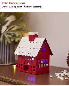 Detailed view of red iron Christmas house with glitter snow and painted metal finish