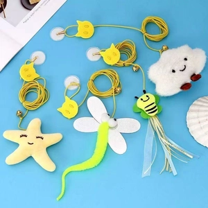 Retractable plush cat toy set with star and dragonfly shapes and suction cups