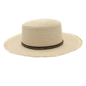 Detail of raffia straw sun hat with beaded band and fringe brim for beach vacations