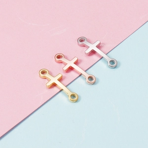Polished stainless steel curved cross charms in gold, rose gold and silver finishes