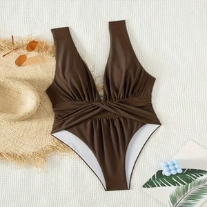 Deep V-neck one-piece swimsuit in chocolate brown with cross wrap waist detail