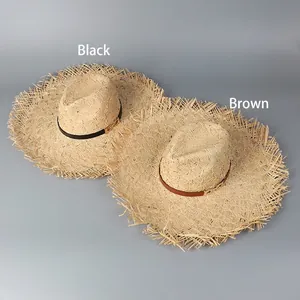 Wide brim raffia sun hats in black and brown with leather straps for summer beach vacation