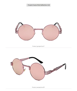 Macro view of C20 steampunk round metal sunglasses with purple engraved frame and pink lenses
