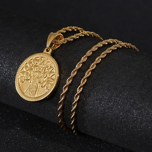 Golden Tree of Life relief pendant necklace with twist chain on black background