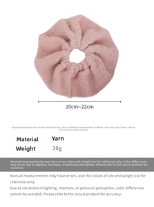 Pink knitted oversized scrunchie showing 20-22cm dimensions and soft yarn texture
