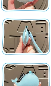 Vues détaillées du porte-clés baleine en cuir bleu clair avec fermeture éclair et crochet