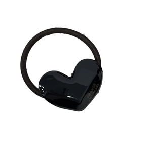 Handmade black heart acetate hair tie with golden lettering for ponytail styling