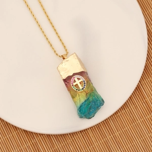 Rainbow crystal stone pendant with golden cross on a twist chain necklace