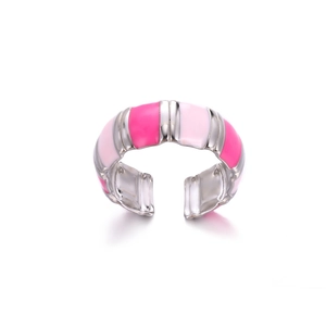 Detail of pink and light pink enamel stripes on a silver-colored stainless steel ring