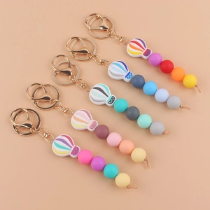 Silicone hot air balloon keychain set with colorful beads and golden metal clasp