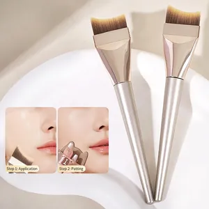 Dual crescent foundation brush set with soft bristles and ergonomic champagne gold handles