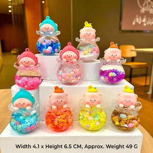 Set of 10 cute pink pig acrylic water ball keychains featuring colorful sequins and caps