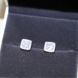 Square zircon stud earrings in silver finish set in a premium grey velvet jewelry box