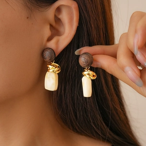 Vintage geometric resin hoop earrings with brown wood and gold twist metal accents