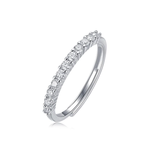 Detailed close-up of a silver pavé open ring featuring multiple clear cubic zirconia stones