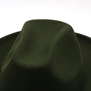 Detailed top view of dark green wool felt jazz hat showing premium fabric texture