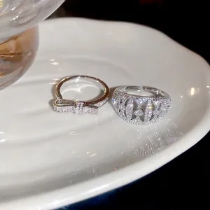 Elegant 18k gold plated silver bow and geometric cutout rings with cubic zirconia