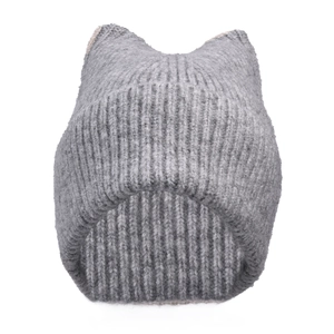 Close-up of grey knit beanie with cat ear design showing soft ribbed texture details