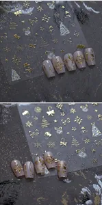 Detailed view of gold Christmas nail stickers featuring snowflakes and stars on nails