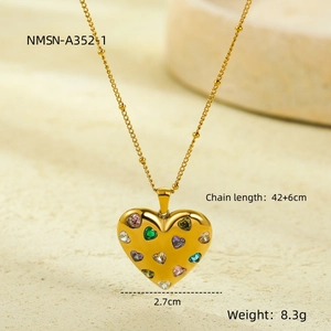 Detail of gold heart pendant with colorful crystals and dimensions 2.7cm by 42+6cm