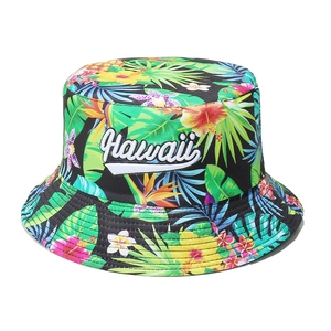 Hawaii style sun hat with tropical palm leaf print and embroidered lettering for summer