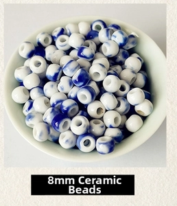 Macro view of 8mm blue and white porcelain beads for handmade jewelry DIY crafting