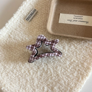 Pinza per capelli a forma di stella con motivo a scacchi marrone e design vuoto