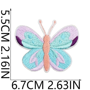 Detailed butterfly embroidery patch in purple and green hues measuring 6.7x5.5cm