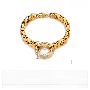 Détail du bracelet cœur en acier plaqué or 18k avec spécifications de taille et poids