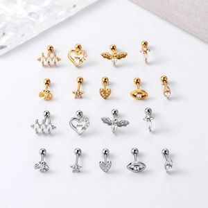 Detail view of assorted stainless steel cartilage studs with zircon in gold and silver