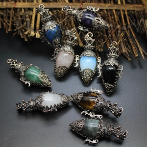 Detailed collection of vintage copper crystal pendants with pentagram star hollow design