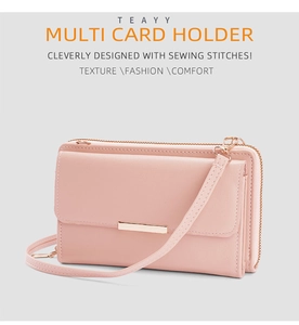 Detail of pink faux leather multi-card holder with gold hardware and sewing stitches