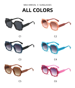 Matrix view of oversized geometric sunglasses in six vibrant colors on white backdrop