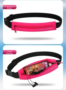Detail view of pink running belt showing storage for phone, keys, and reflective strip