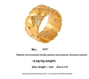 Detailed close-up of a double-layered 18K gold plated heart ring with sparkling rhinestones