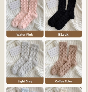 Detailed cable-knit texture of soft thermal winter socks in various candy colors