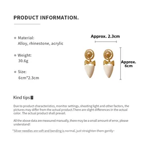 Detailed view of vintage bow heart earrings with alloy dimensions and materials data