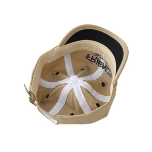 Internal view of khaki baby baseball cap with FRIENDS embroidery and adjustable buckle