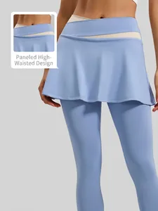 Sky blue high-waisted yoga skort with ivory contrast waistband and mock two-piece design